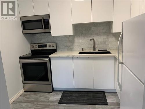 1105 Belfry Avenue Unit# 208, Sudbury, ON - Indoor Photo Showing Kitchen With Upgraded Kitchen
