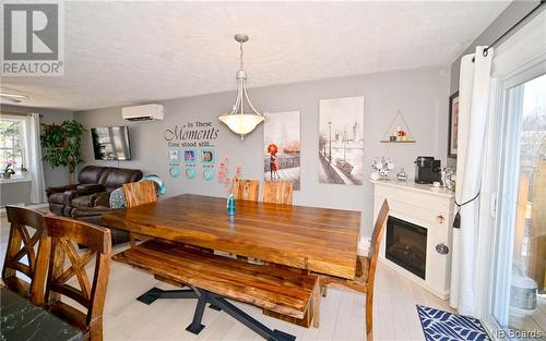 7 Parkview Avenue, Oromocto, NB - Indoor Photo Showing Dining Room With Fireplace