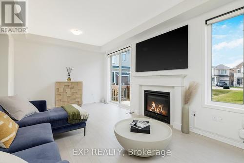 495 Violet Gate, Milton, ON - Indoor Photo Showing Living Room With Fireplace