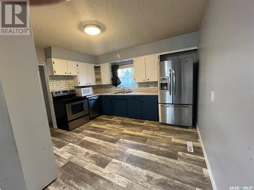 1551 Frohlick Street, Holdfast, SK - Indoor Photo Showing Kitchen With Double Sink