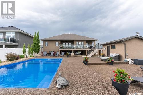 415 Palmer Crescent, Warman, SK - Outdoor With In Ground Pool With Deck Patio Veranda With Exterior