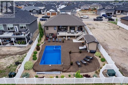 415 Palmer Crescent, Warman, SK - Outdoor With In Ground Pool With Deck Patio Veranda