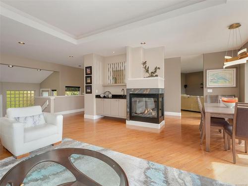 3450 Lord Nelson Way, Saanich, BC - Indoor Photo Showing Living Room With Fireplace