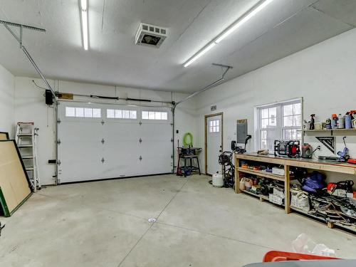Garage - 96 111E Avenue, Saint-Hippolyte, QC - Indoor Photo Showing Garage