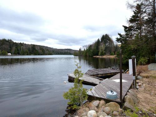 Waterfront - 126 Ch. Du Lac-Des-Esclaves, Harrington, QC - Outdoor With Body Of Water With View