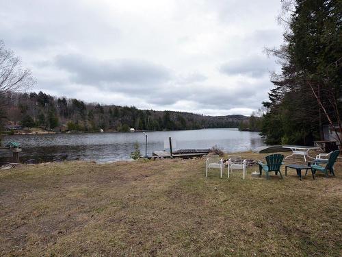Exterior - 126 Ch. Du Lac-Des-Esclaves, Harrington, QC - Outdoor With Body Of Water With View