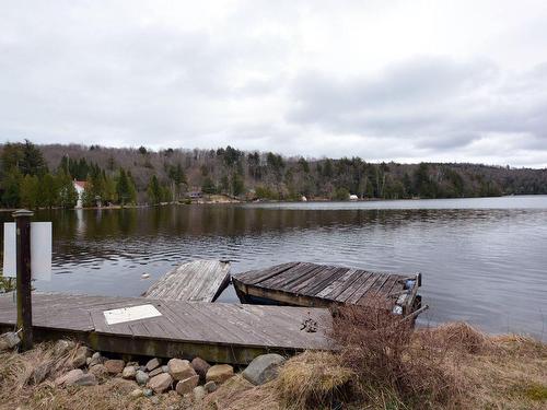 Waterfront - 126 Ch. Du Lac-Des-Esclaves, Harrington, QC - Outdoor With Body Of Water With View