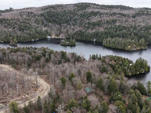 Aerial photo - 126 Ch. Du Lac-Des-Esclaves, Harrington, QC - Outdoor With Body Of Water With View