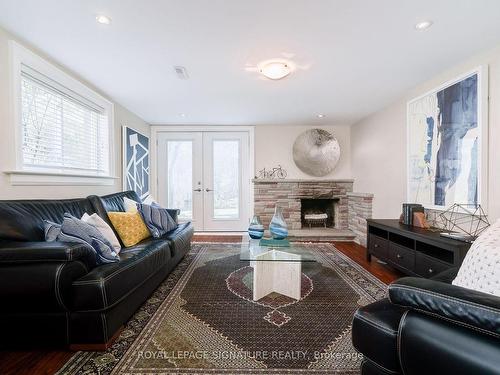 31 Woodthrush Crt, Toronto, ON - Indoor Photo Showing Living Room With Fireplace
