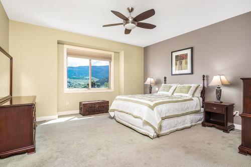 516 Middleton Way, Coldstream, BC - Indoor Photo Showing Bedroom