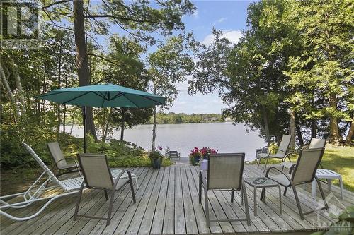 Lakeside - 154 Bluff Point Drive, Calabogie, ON - Outdoor With Body Of Water With Deck Patio Veranda
