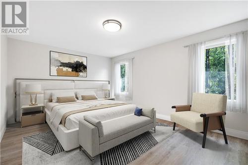 Virtually staged primary bedroom - 2976 Johnston Road, Renfrew, ON - Indoor Photo Showing Bedroom