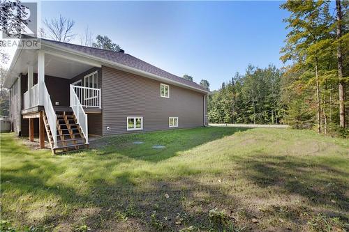 Covered deck with yard access. Propane tanks. Also heated with heat pump. - 2976 Johnston Road, Renfrew, ON - Outdoor
