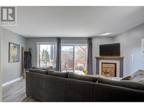 5812 Richfield Place, Vernon, BC - Indoor Photo Showing Living Room With Fireplace