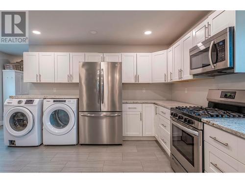 6449 97 Highway, Falkland, BC - Indoor Photo Showing Laundry Room