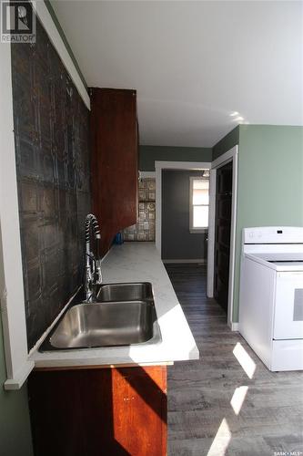 224 Front Street, Eastend, SK - Indoor Photo Showing Kitchen With Double Sink
