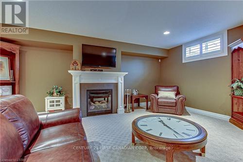 17 - 725 Eagletrace Drive, London, ON - Indoor Photo Showing Basement With Fireplace