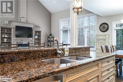 111 Earl Street, Wasaga Beach, ON - Indoor Photo Showing Kitchen With Fireplace With Double Sink