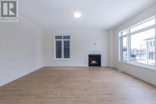 32 Daisy Street, Springwater, ON - Indoor With Fireplace