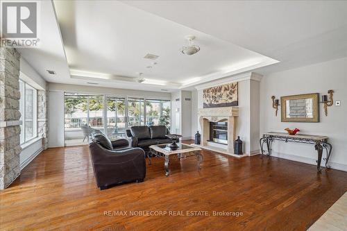 #114 -2506 Rutherford Rd, Vaughan, ON - Indoor Photo Showing Living Room With Fireplace