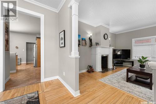 645 Hochelaga Street W, Moose Jaw, SK - Indoor Photo Showing Living Room With Fireplace