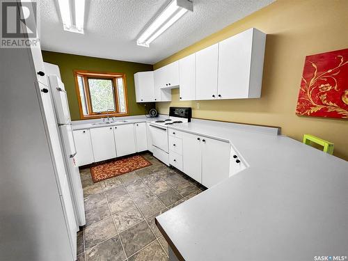205 Wall Ridge Trail, Lac Pelletier, SK - Indoor Photo Showing Kitchen