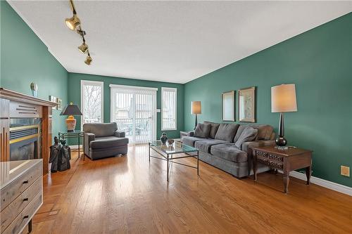 238 Alderlea Avenue, Mount Hope, ON - Indoor Photo Showing Living Room With Fireplace