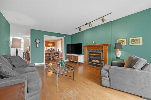 238 Alderlea Avenue, Mount Hope, ON - Indoor Photo Showing Living Room With Fireplace