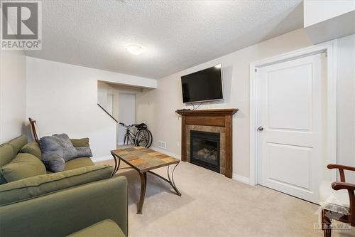 419 Haresfield Court, Ottawa, ON - Indoor Photo Showing Living Room With Fireplace