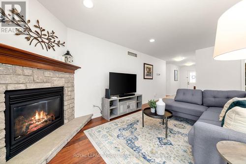 29 Forest Dr, Brighton, ON - Indoor Photo Showing Living Room With Fireplace