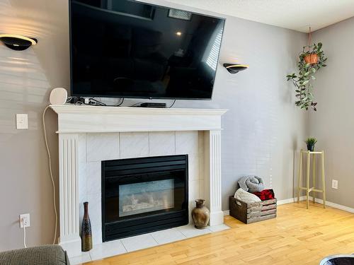 1300 20Th Street S, Cranbrook, BC - Indoor Photo Showing Living Room With Fireplace