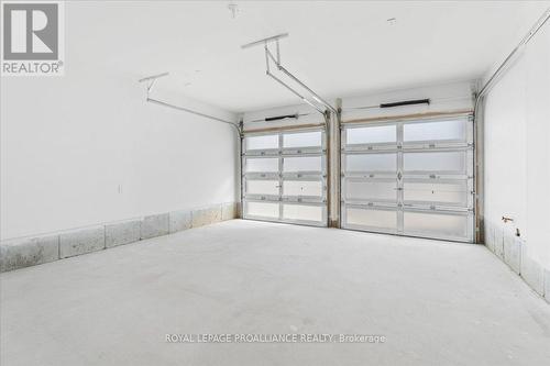 17 Corley St, Kawartha Lakes, ON - Indoor Photo Showing Garage