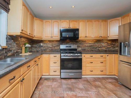 20 Redwing Pl, Toronto, ON - Indoor Photo Showing Kitchen With Double Sink