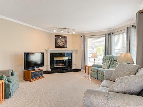 1667 Sonora Drive, Kelowna, BC - Indoor Photo Showing Living Room With Fireplace