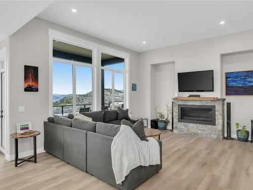 2232 Lavetta Drive, Kelowna, BC - Indoor Photo Showing Living Room With Fireplace