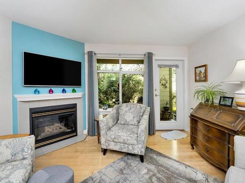 107-2777 Barry Rd, Mill Bay, BC - Indoor Photo Showing Living Room With Fireplace