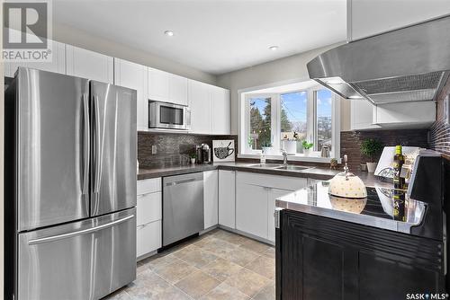 2710 Clarence Avenue S, Saskatoon, SK - Indoor Photo Showing Kitchen With Stainless Steel Kitchen With Double Sink