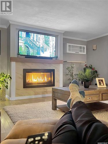 307 B Currie Avenue, Round Lake, SK - Indoor Photo Showing Living Room With Fireplace