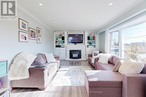 823 Essa Road, Barrie, ON - Indoor Photo Showing Living Room With Fireplace