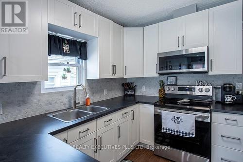 14 Page St, St. Catharines, ON - Indoor Photo Showing Kitchen With Double Sink