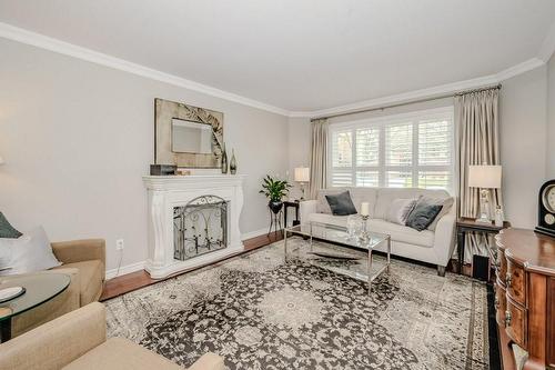 1518 Cottontree Drive, Burlington, ON - Indoor Photo Showing Living Room With Fireplace