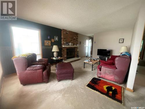 1623 Macpherson Avenue, Regina, SK - Indoor Photo Showing Living Room With Fireplace