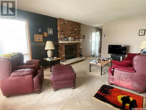 1623 Macpherson Avenue, Regina, SK - Indoor Photo Showing Living Room With Fireplace