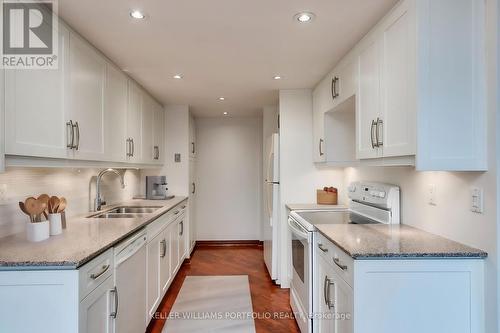 605 - 55 Wellesley Street E, Toronto, ON - Indoor Photo Showing Kitchen With Double Sink