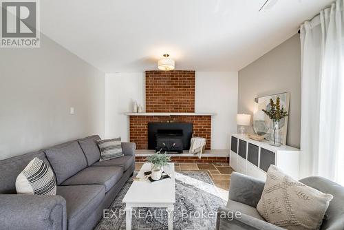 5201 Main St, Clarington, ON - Indoor Photo Showing Living Room With Fireplace
