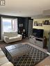 205 820 5Th Street Ne, Weyburn, SK  - Indoor Photo Showing Living Room 