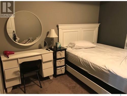 205 820 5Th Street Ne, Weyburn, SK - Indoor Photo Showing Bedroom