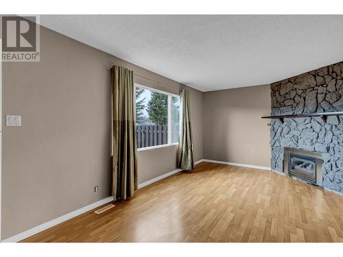 179 111 Tabor Boulevard, Prince George, BC - Indoor Photo Showing Living Room With Fireplace