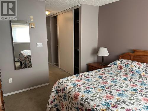 207 104 5Th Street Ne, Weyburn, SK - Indoor Photo Showing Bedroom
