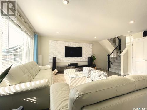 371 Hassard Close, Saskatoon, SK - Indoor Photo Showing Living Room With Fireplace